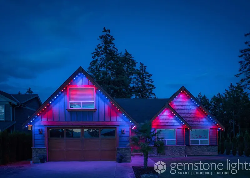 Red, white and blue across a ranch home for the Fourth