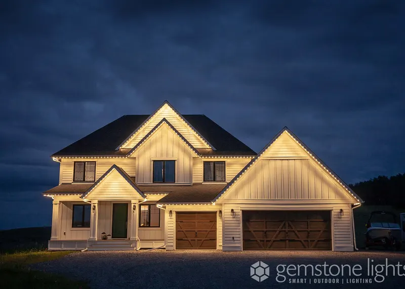 Warm white along every gable of a two-story home