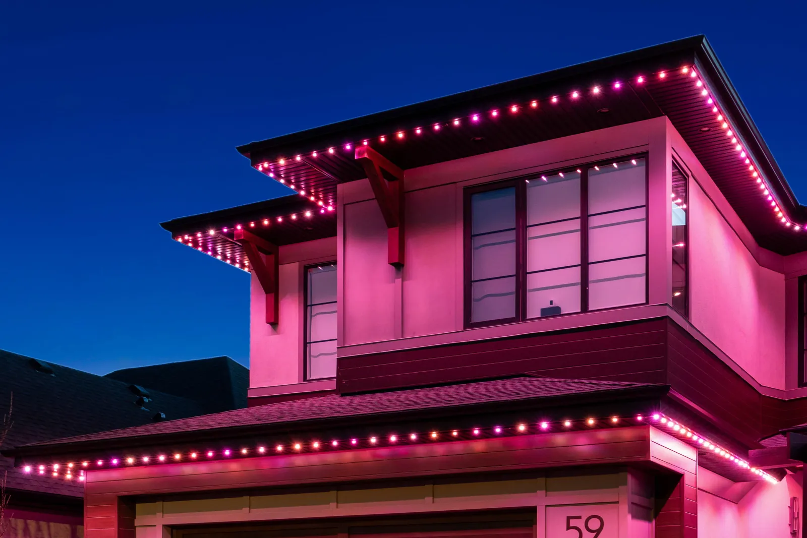 Modern home washed in pink light